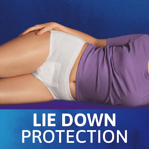 A woman in a purple t-shirt is lying down while wearing TENA underwear. A text underneath the image reads "Lie down protection"