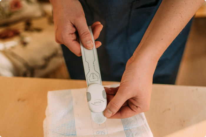 Een afbeelding van de TENA SmartCare Change Indicator