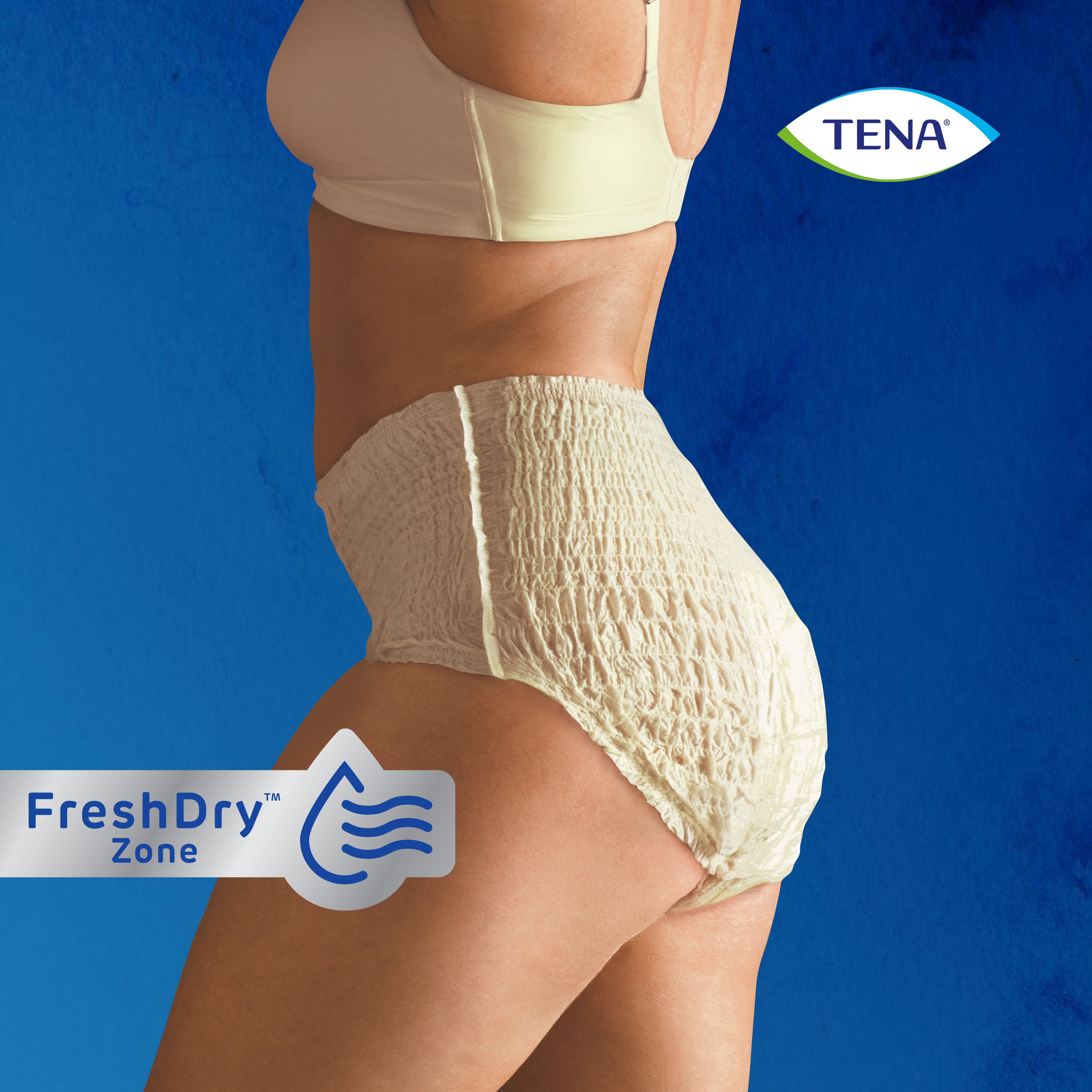 Side profile of a body demonstrating how the cream colored TENA pants looks on a person