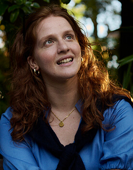 Woman helping friend in changing room