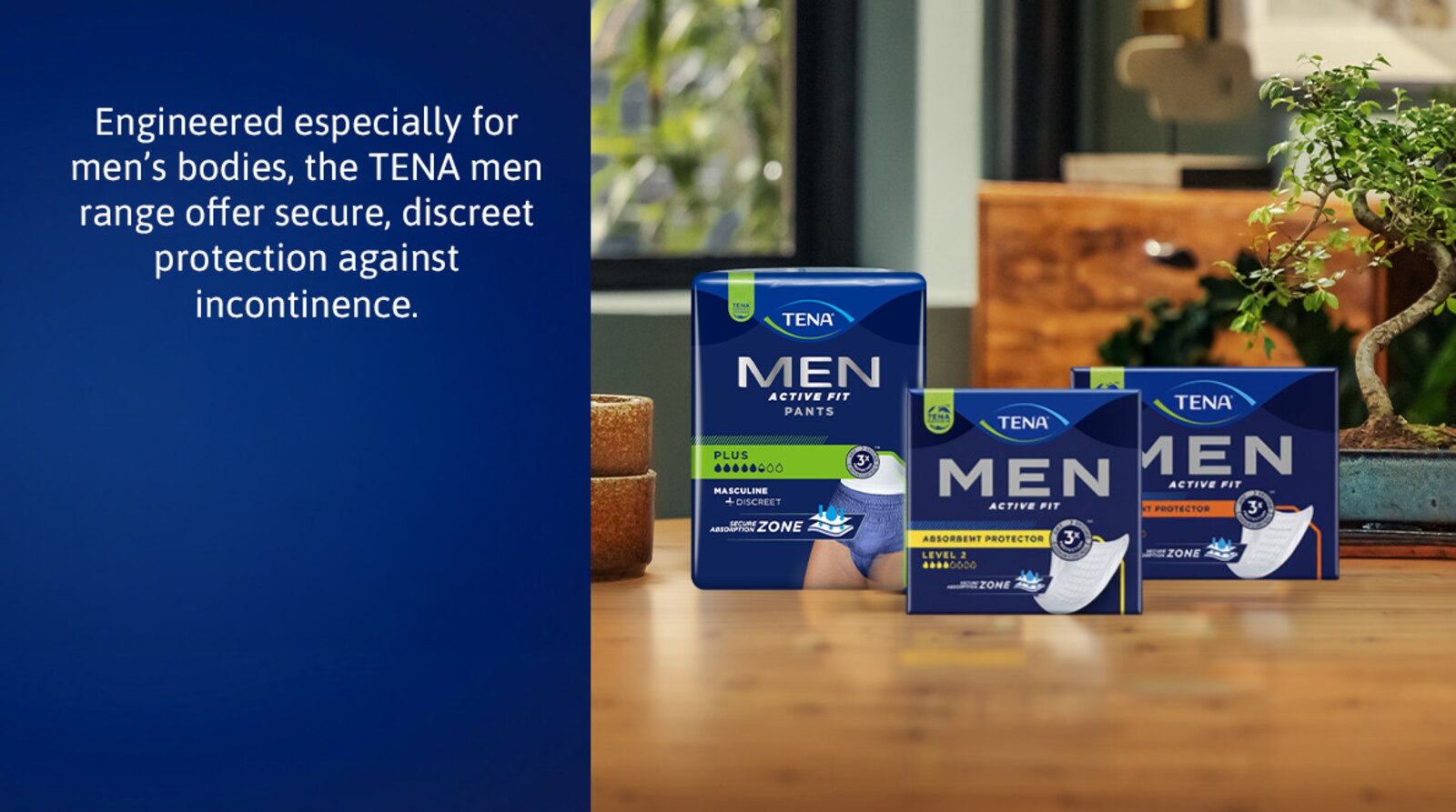 Man wearing grey TENA Men Active Fit Pants in a changing room
