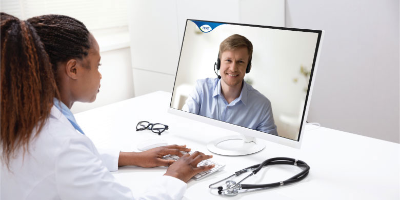 Image of Doctor and TENA sales representative having a discussion virtually - TENA Professional