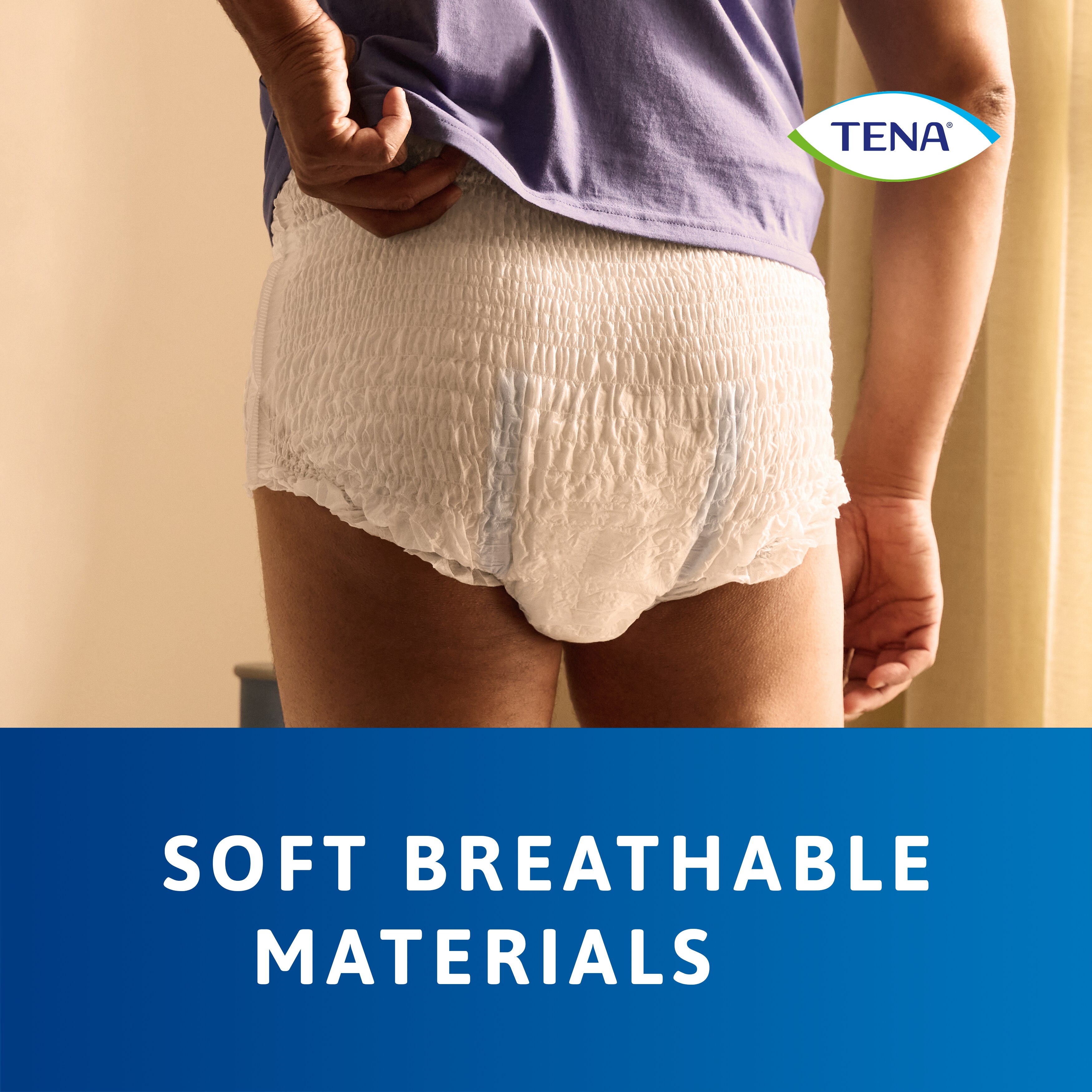 Wearing the TENA Pants protect+ on body without clothes, demonstrating the soft breathable materials of the product.