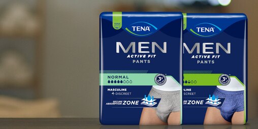 Produktverpackungsfotos von TENA Pants in Grau und Blau