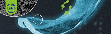 Radiographie d’une serviette d’incontinence, montrant un détail des fibres du noyau absorbant de la serviette 