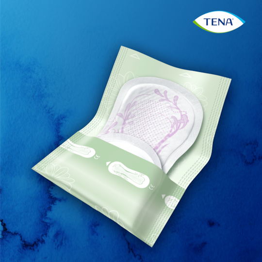 Opening a TENA Discreet Mini single wrapped
