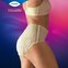 A woman wearing TENA Silhouette Creme seen from the side

