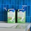 Packs of TENA Discreet Ultra Pad Mini and Normal on a sideboard Packs of TENA Discreet Ultra Pad Mini and Normal on a sideboard