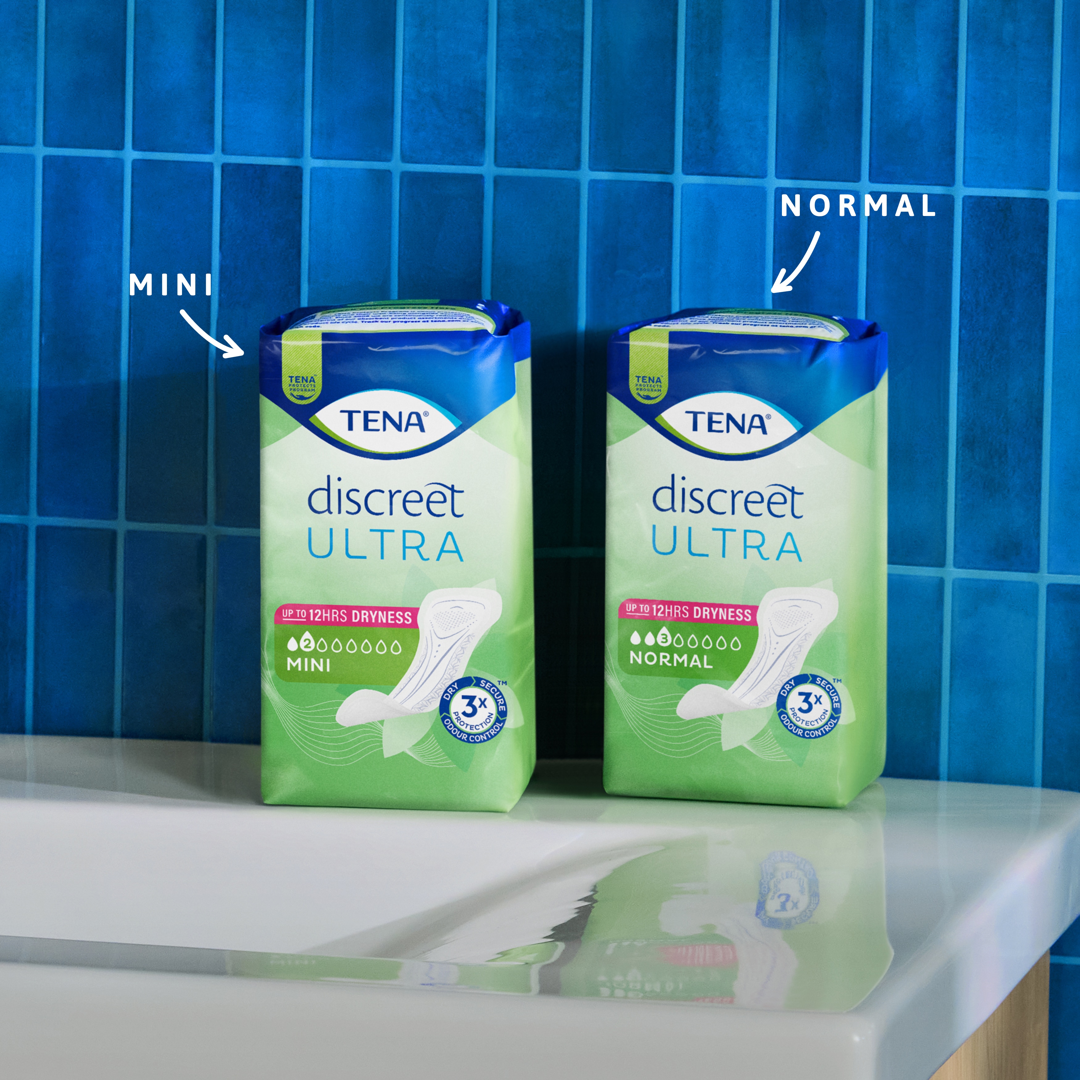Packs of TENA Discreet Ultra Pad Mini and Normal on a sideboard