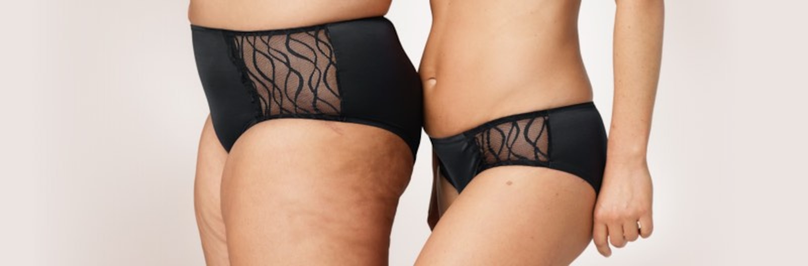 Close up of of two women wearing the TENA Silhouette Washable Absorbent Underwear. 