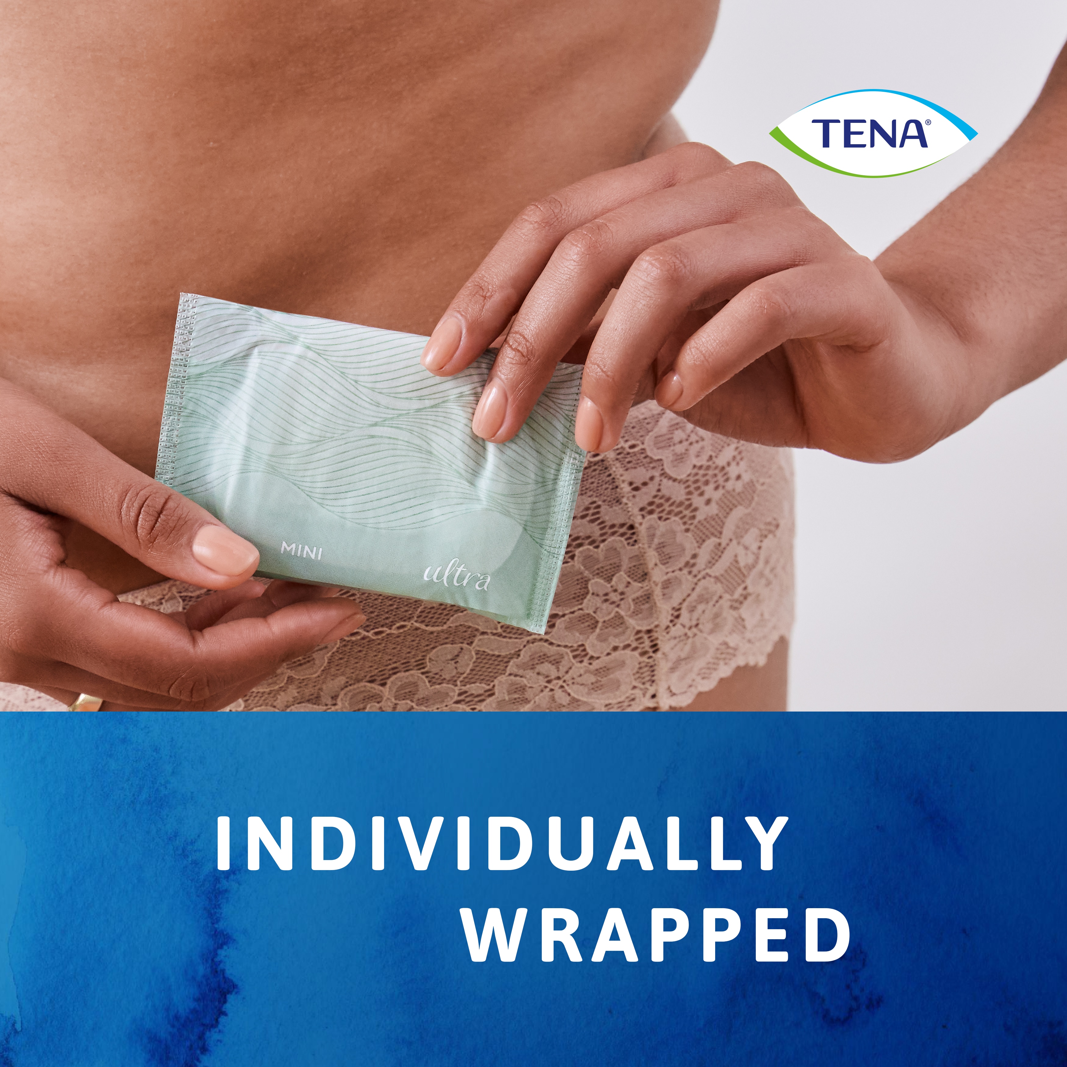 Woman holding TENA Discreet Ultra Pad which is individually wrapped. 
