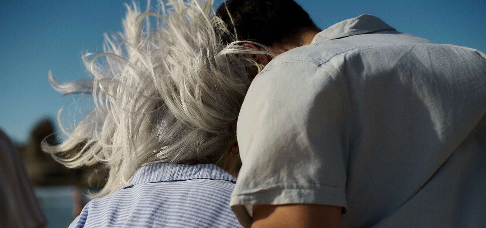 TENA-CGR-Sustainability-Lifestyle-Mother-son-closeup-behind-hugging-on-beach-Campaign-1600x750px.jpg                                                                                                                                                                                                                                                                                                                                                                                                                