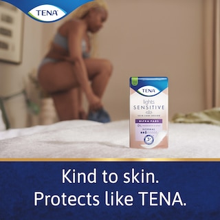 TENA Lights Sensitive Normal pad displayed with a woman putting on clothes, with the caption "kind to skin. Protects like TENA" 