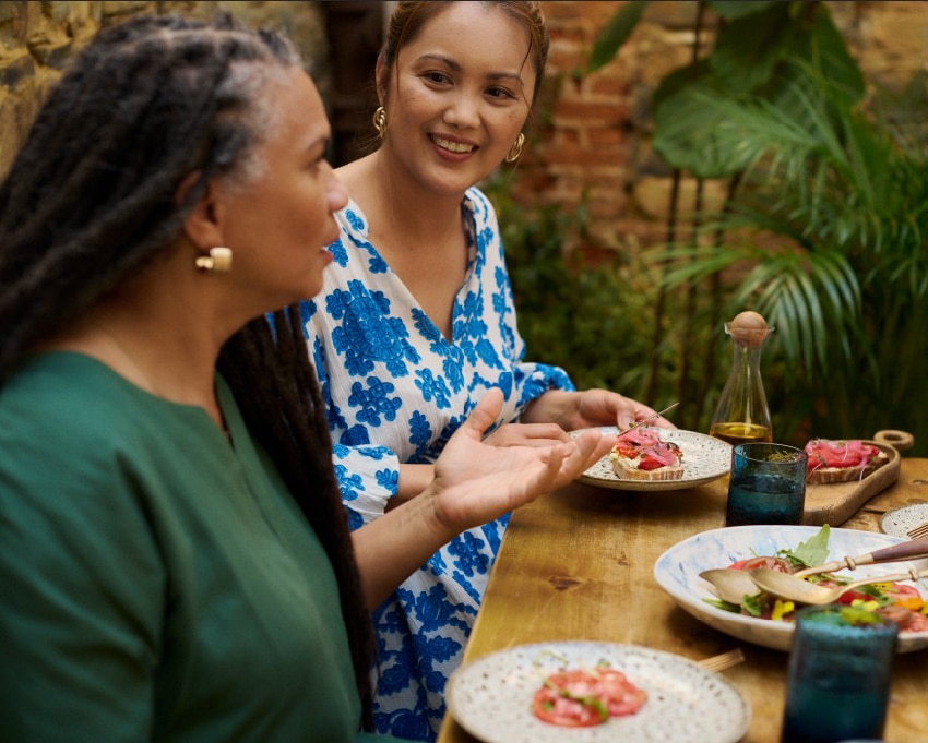 Two women eating a healthy meal together