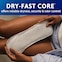 Woman holding the Sensitive Care pad with both her hands. The caption says" Dry-Fast core offers reliable dryness, security and odor control".