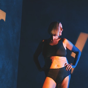 Woman wearing TENA Women Silhouette HW Black