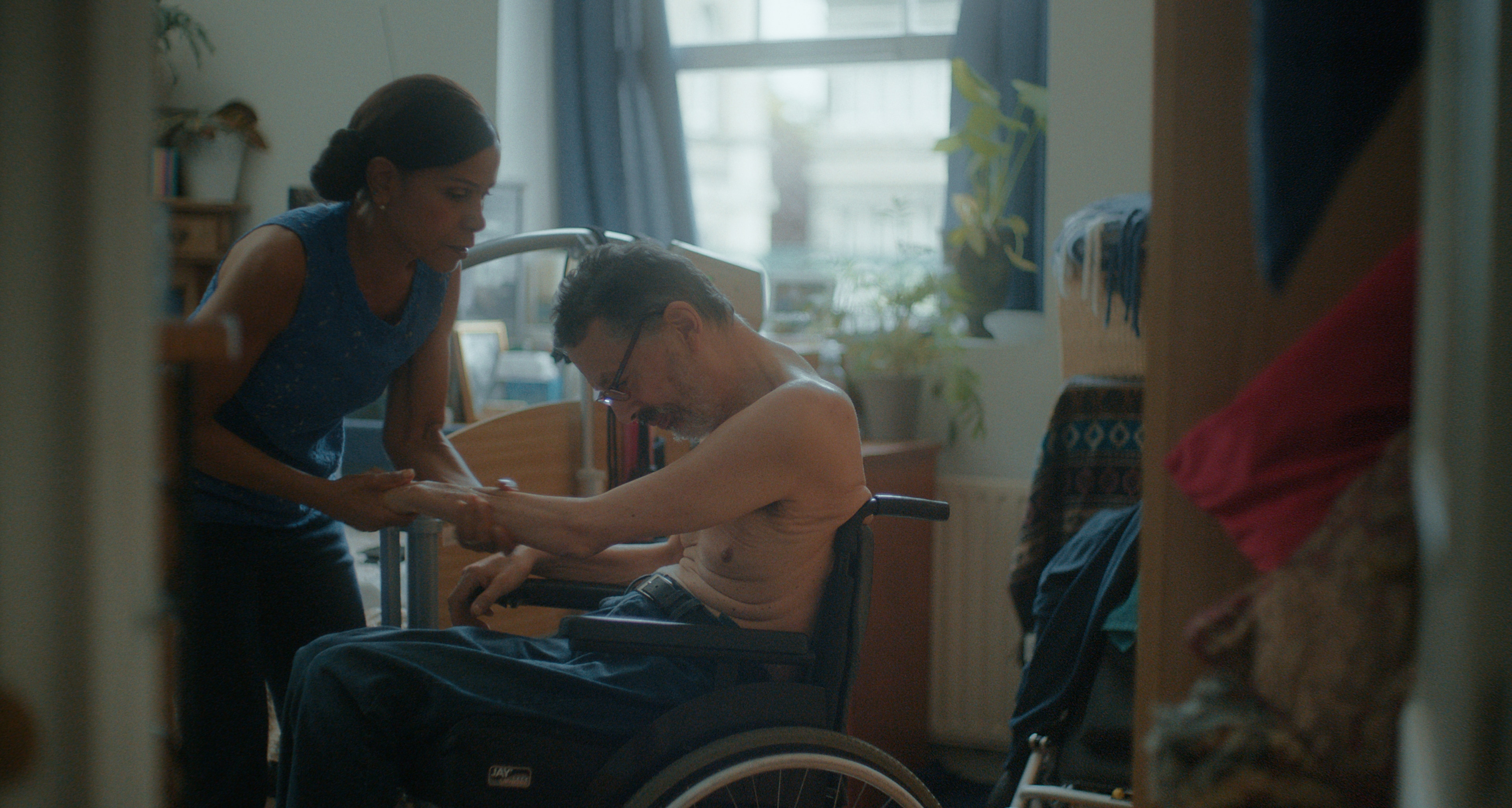 TENA-CGR-NoLoveLikeIt-wife-helps-husband-in-wheelchair-PB                                                                                                                                                                                                                                                                                                                                                                                                                                                           