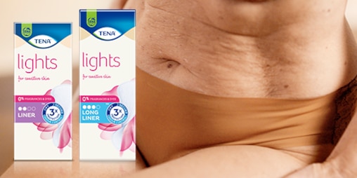 Photo d'un ventre de femme avec les paquets TENA lights