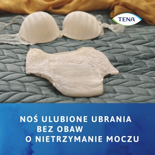 Kremowa bielizna TENA Lady leżąca na łóżku z dopasowanym biustonoszem