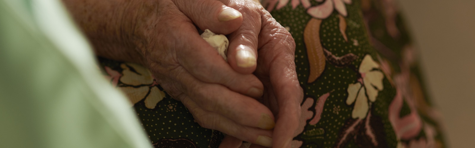 Hands of a care home resident. 