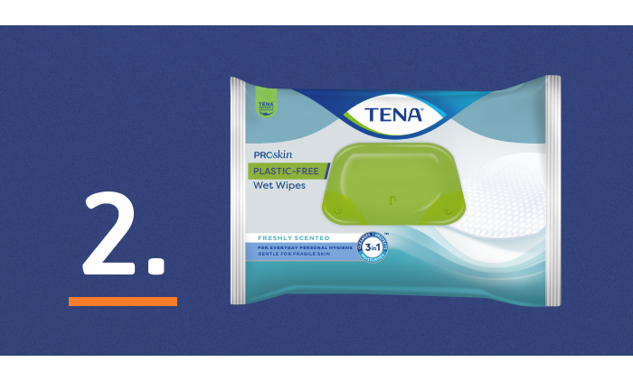 Ein Bild mit TENA ProSkin-Reinigungstüchern neben der Zahl 2. Die Zahl 2 steht für "Sauberkeit" - der zweite Schritt in der 3-Schritte-Hautgesundheitslösung von TENA.