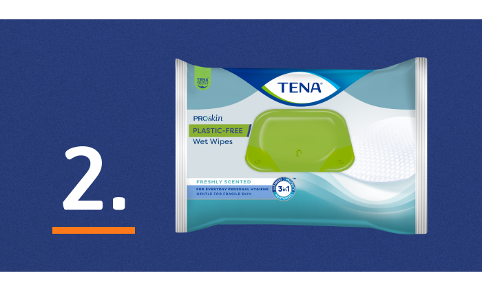 Ein Bild mit TENA ProSkin-Reinigungstüchern neben der Zahl 2. Die Zahl 2 steht für "Sauberkeit" - der zweite Schritt in der 3-Schritte-Hautgesundheitslösung von TENA.