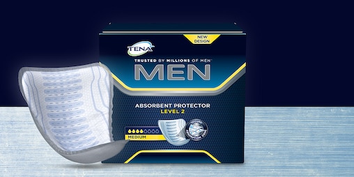Package and product TENA Men Absorbent Protectors on display