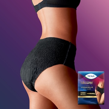 A woman from the side wearing a TENA Silhouette Black low waist normal