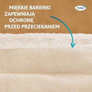 Mocna bariera TENA zapewnia ochronę przed przeciekaniem, widoczna strzałka wskazuje na warstwę ochronną.