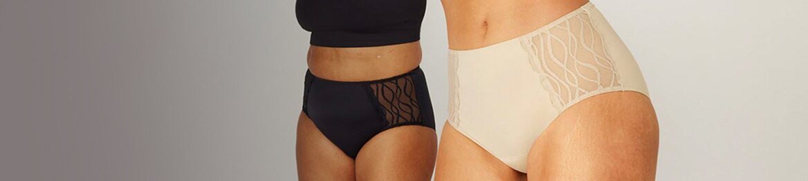 Two women standing next to each other, wearing TENA Silhouette Washable underwear in black and beige.