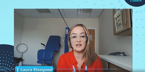 Screen shot of Laura speaking to the camera during the webinar with her clinic room in the background