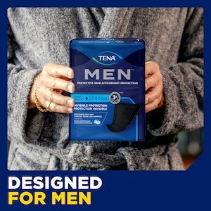 Person holding up the pack of TENA Men Protective Shield Light with the caption "designed for men"